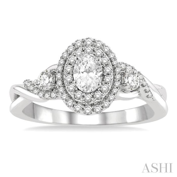 5/8 ctw Split Twisted Shank Round Cut Diamond Engagement Ring With 1/4 ct Oval Cut Center Stone in 14K White Gold