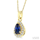 5x3 MM Pear Shape Sapphire and 1/20 Ctw Single Cut Diamond Halo Precious Pendant with Chain in 10K Yellow Gold