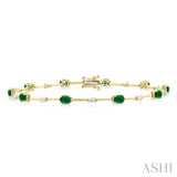 4x3 MM Oval Cut Emerald and 1/3 Ctw Round Cut Diamond Precious Bar Bracelet in 14K Yellow Gold