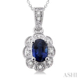 6x4 MM Oval Cut Sapphire and 1/20 Ctw Round Cut Diamond Pendant in Sterling Silver with Chain
