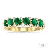 4x3 MM Oval Shape Emerald and 1/5 Ctw Round Cut Diamond Precious Band in 14K Yellow Gold