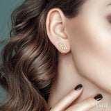 1/6 Ctw Curved Petite Baguette Cut Diamond Fashion Stud Earrings in 10K Yellow Gold
