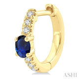 4X3 MM Oval Cut Sapphire and 1/10 Ctw Petite Round Cut Diamond Fashion Huggies in 10K Yellow Gold