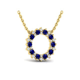Diamond and Blue Sapphire Open Starburst Circle Pendant Necklace