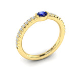 Diamond and Oval Sapphire Centerstone Ring