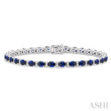 5/8 ctw Round Cut Diamond and 4X3MM Oval Cut Sapphire Precious Bracelet in 14K White Gold